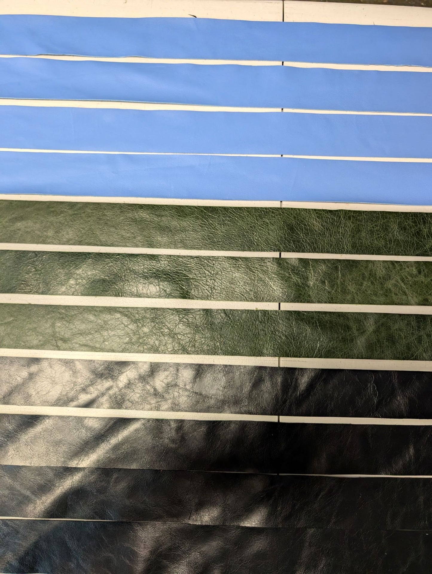 Top to bottom: Carolina Blue, Dark Green, Black