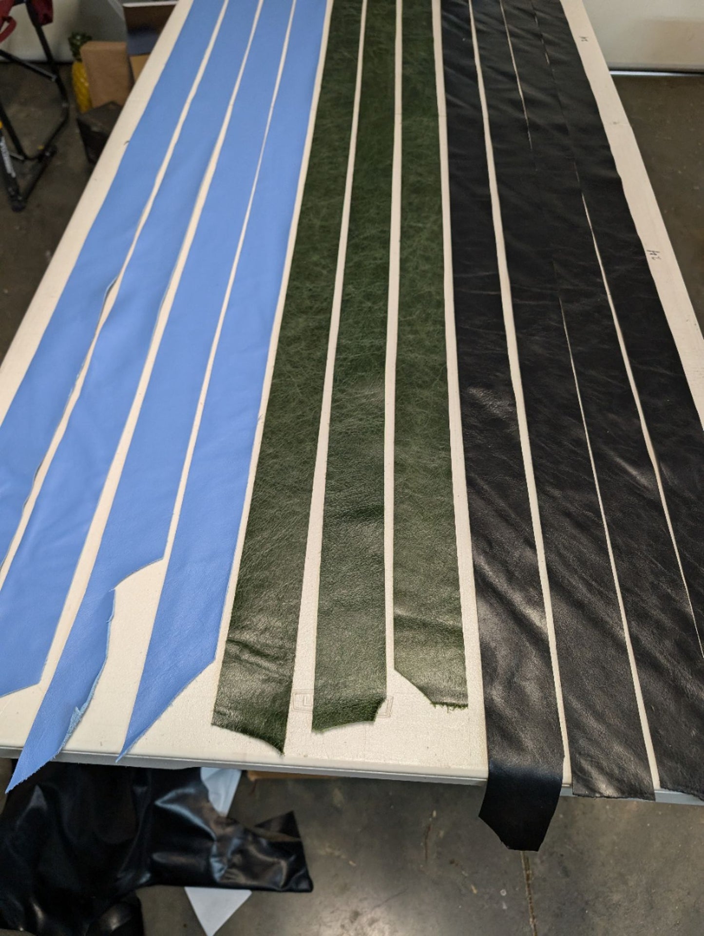 Left to right - Carolina Blue, Dark Green, Black