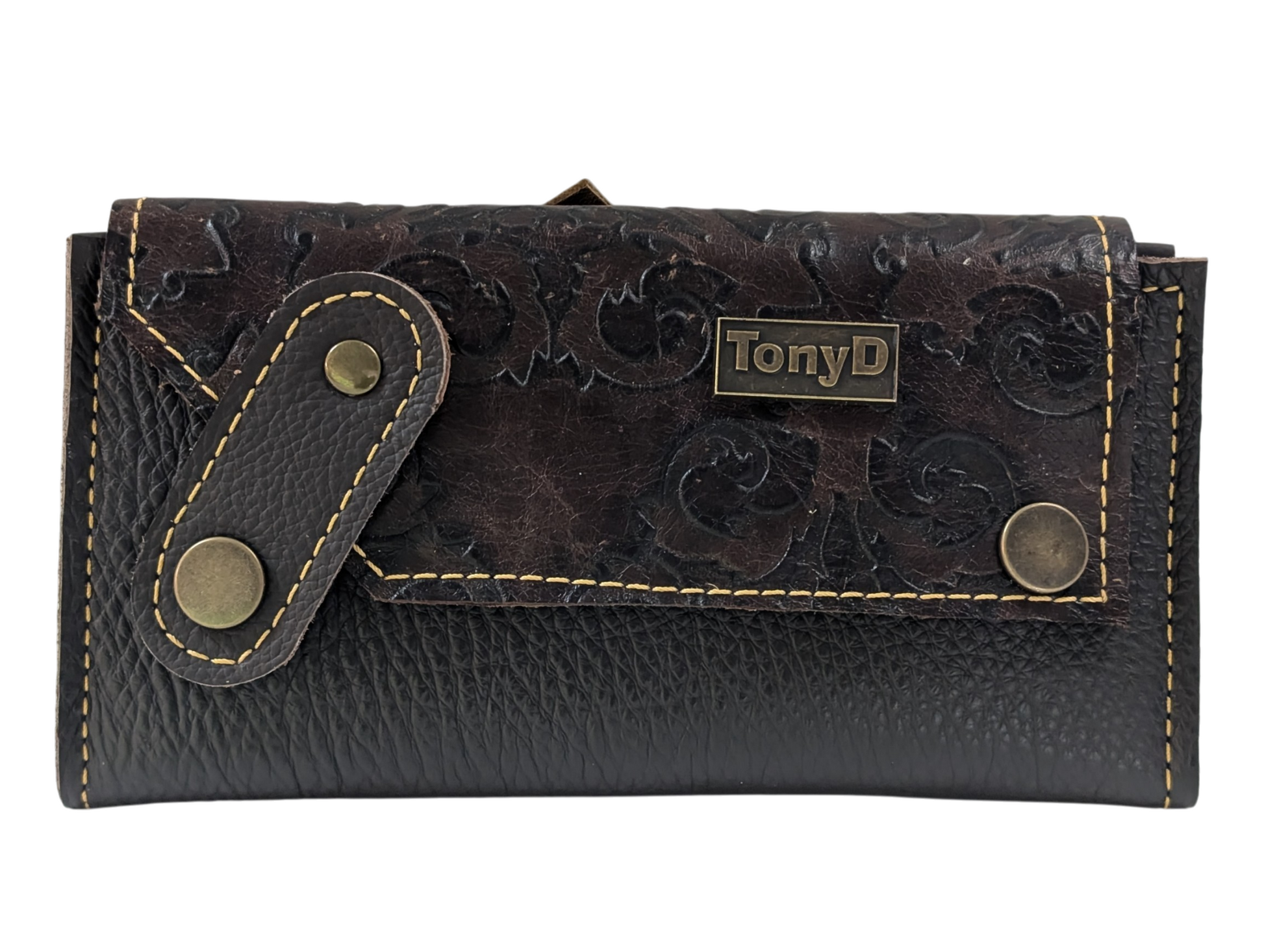 Brown leather wallet with floral embossing and gold accents